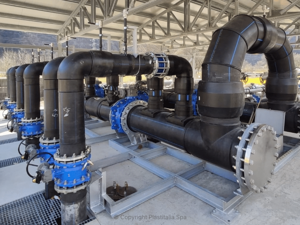 Large-diameter pipework and valves in a civil infrastructure installation.